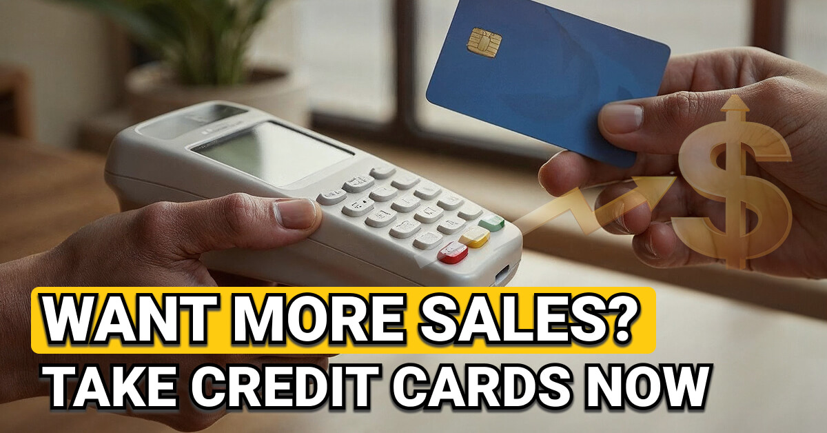 Close-up of a person holding a card reader while another person makes a payment with a blue credit card. A golden dollar sign and upward arrow symbolize financial growth. Overlaid text reads: “Want More Sales? Take Credit Cards Now.”